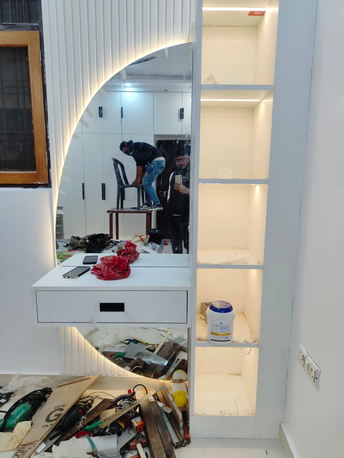 Dressing unit with mirror and display shelves